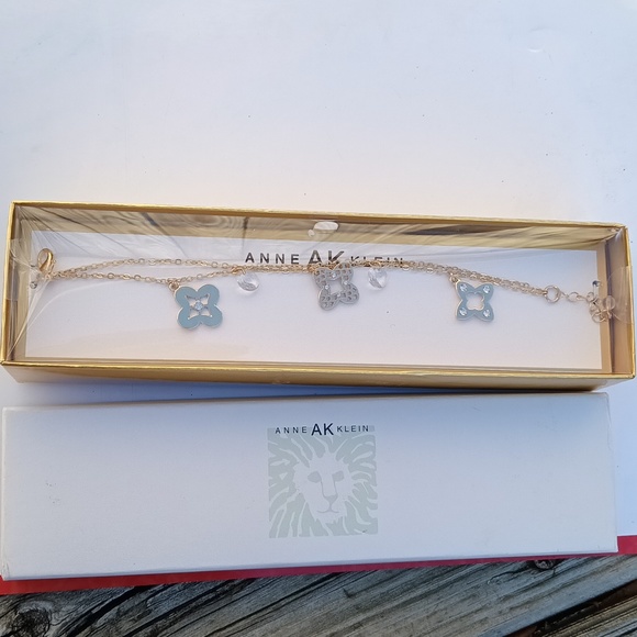 Anne Klein Jewelry - Anne Klein womens Jewelry charm bracelet in gold \ ivry tone New